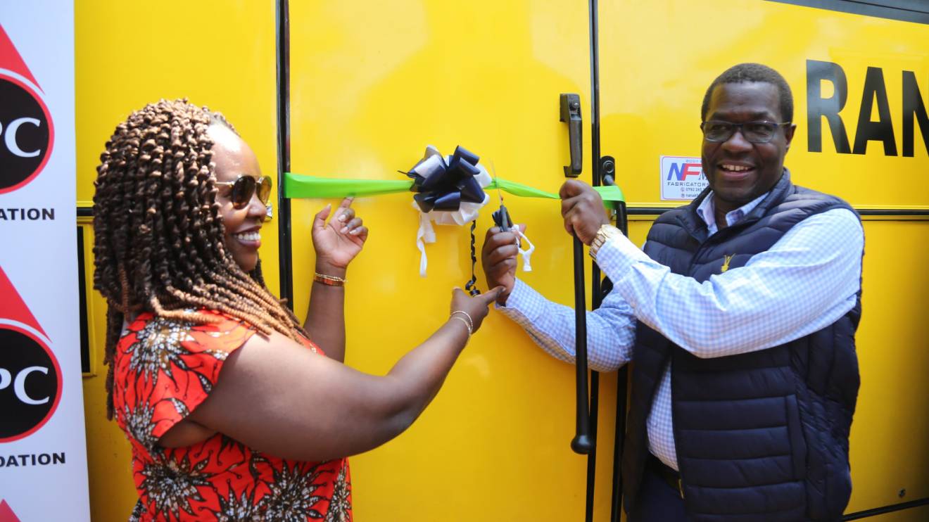 Zilper Abong'o and Opiyo Wandayi officially commission the new Rangala Boys Secondary School bus. PHOTO/COURTESY